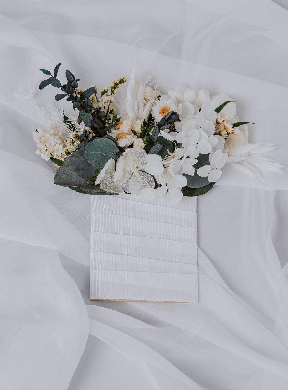 Eucalyptus and daisies pocket boutonniere