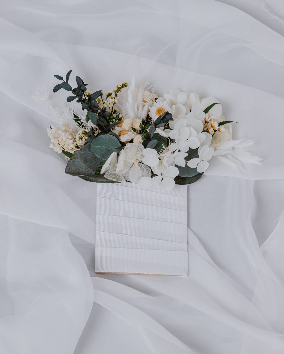 Eucalyptus and daisies pocket boutonniere