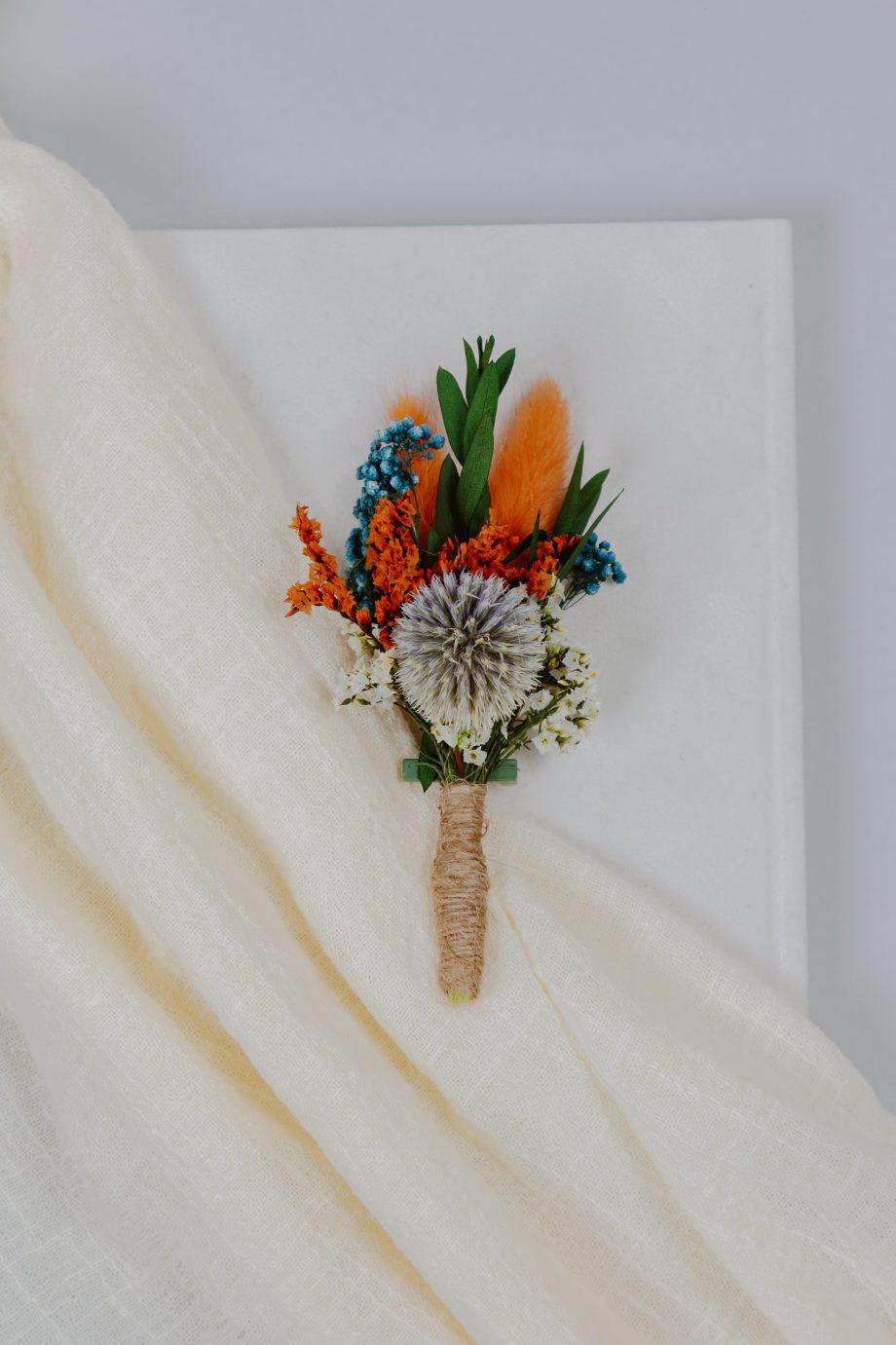 Dusty blue Burnt orange Thistle boutonniere
